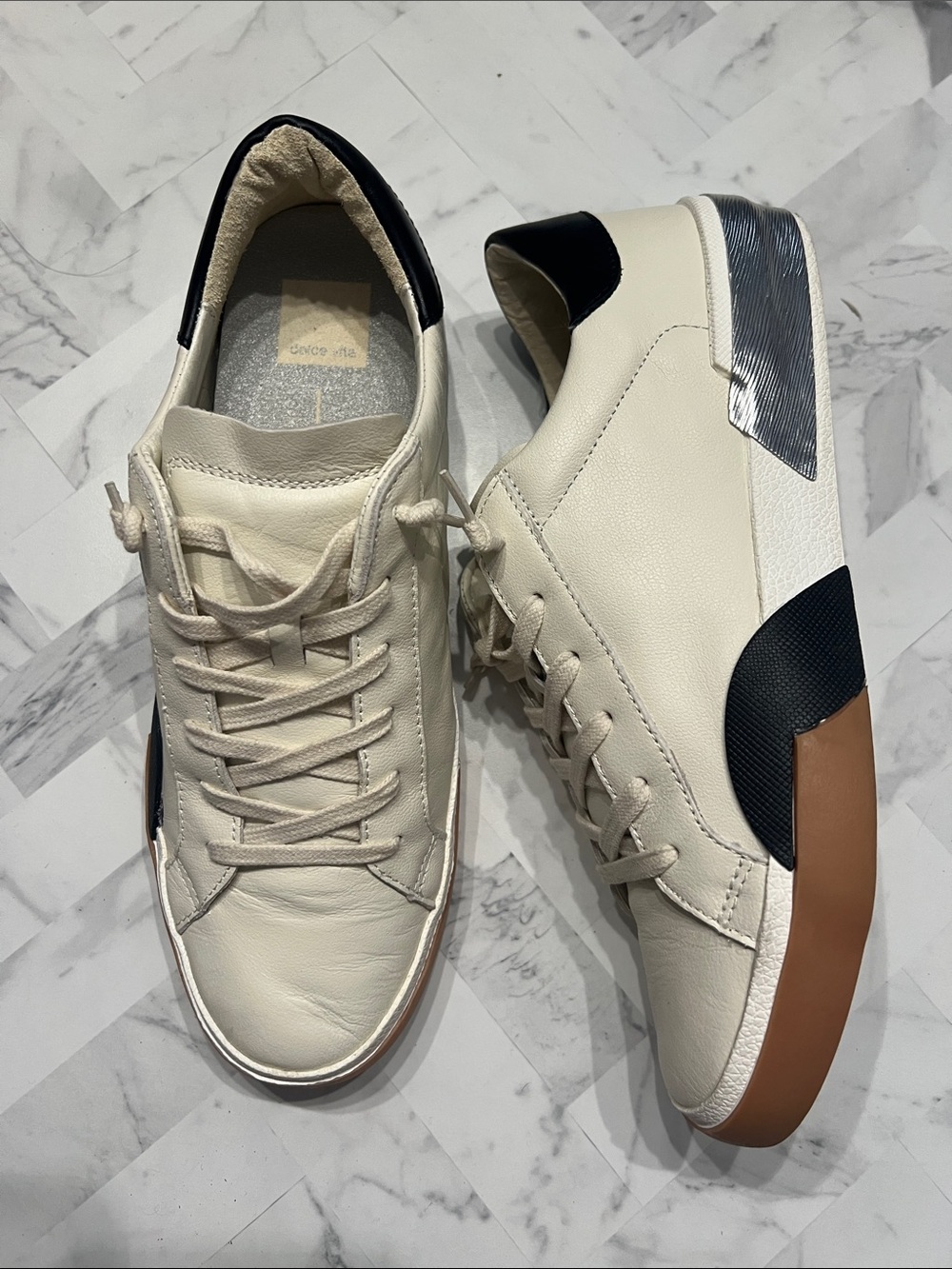Dolce Vita Cream Sneakers with Black & Brown Accents